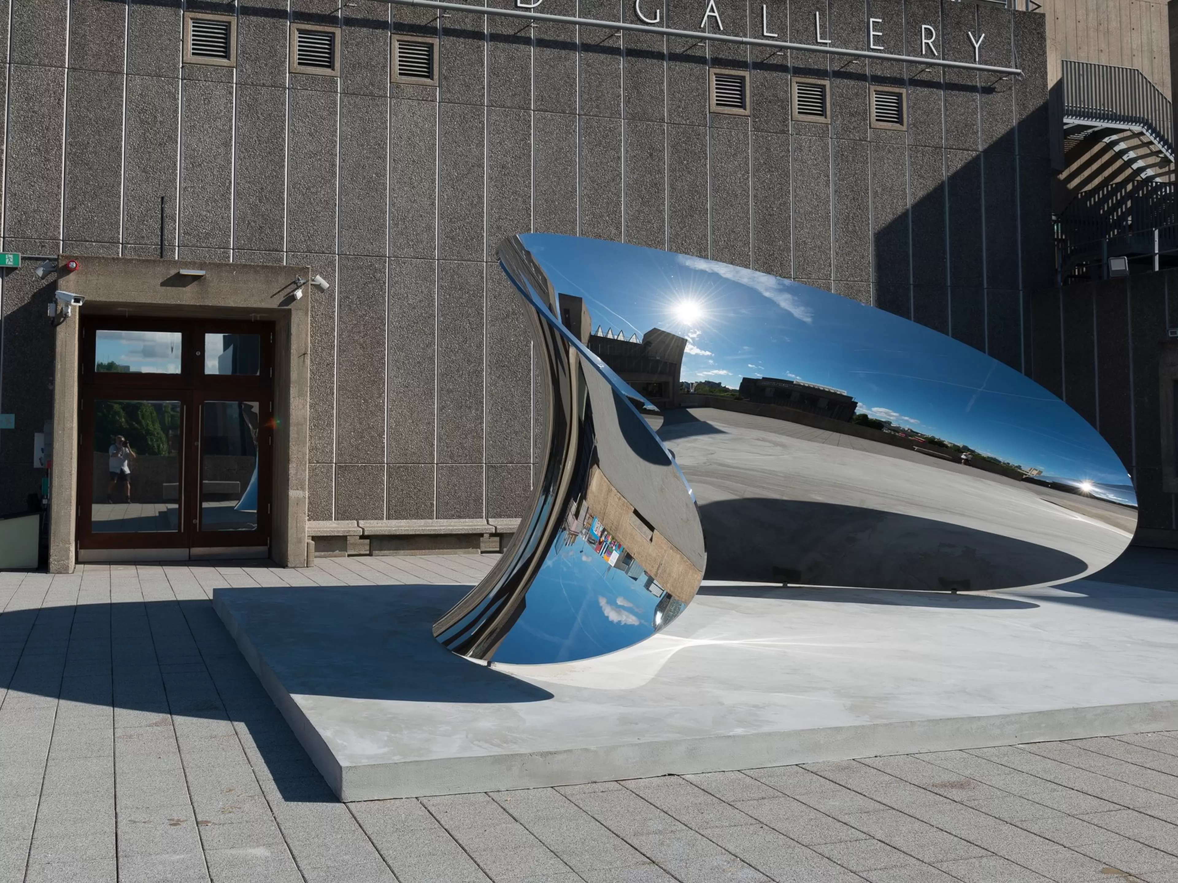 A stainless steel large sculpture by Anish Kapoor at London Hayward Gallery
