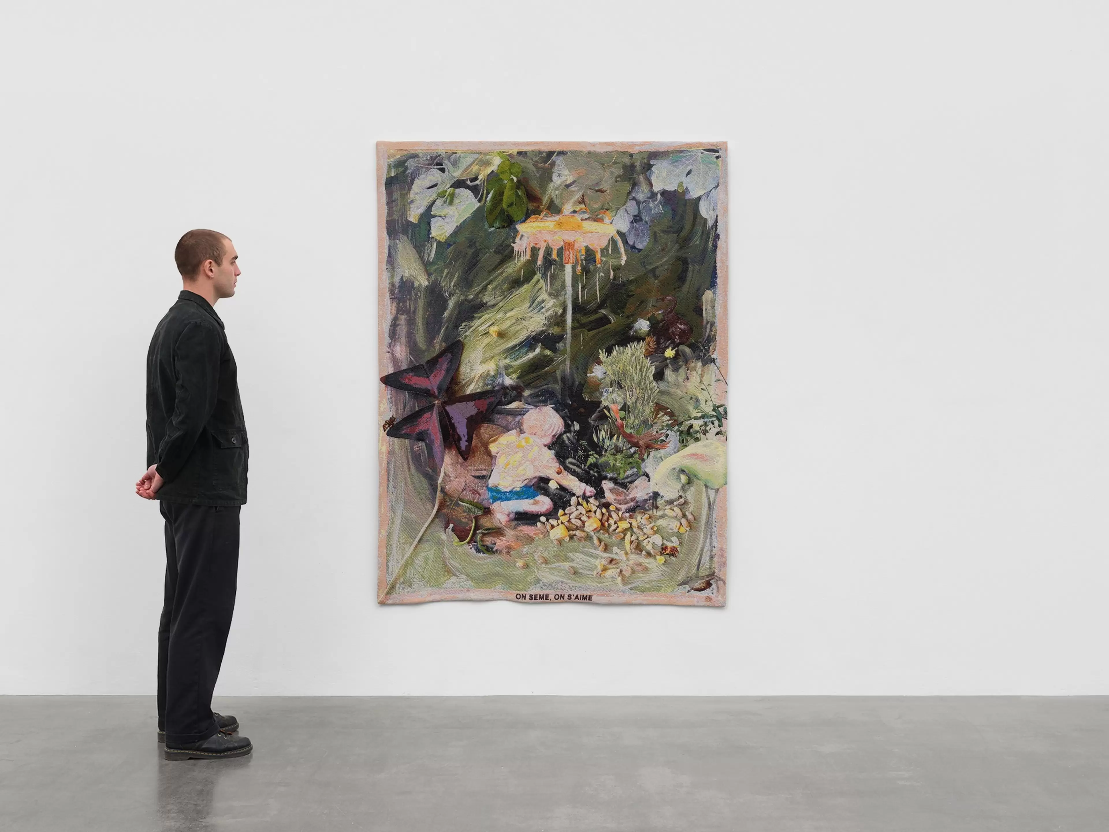 Laure Prouvost, On Seme, On S'Aime (2026), tapestry displayed against a white gallery wall.